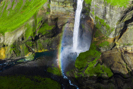 Aerial view of Haifoss waterfall and rainbow in Thjorsardalur valleyの写真素材