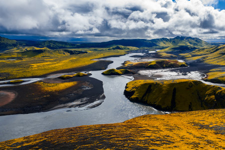 Aerial view of glacial river and lava fields near Landmannalaugarの写真素材