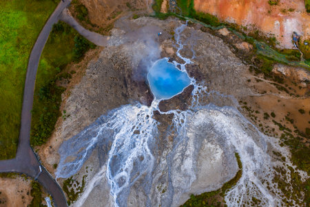 Aerial geothermal pool with mineral deposits in Icelands Golden Circleの写真素材
