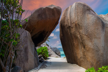 Granite arch and sandy path at Anse Source dArgent, La Digueの写真素材