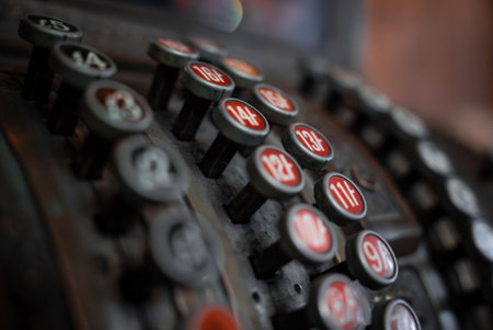 Close up of antique cash register keysの写真素材