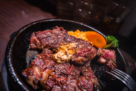 Seared steak with butter in cast iron skilletの写真素材