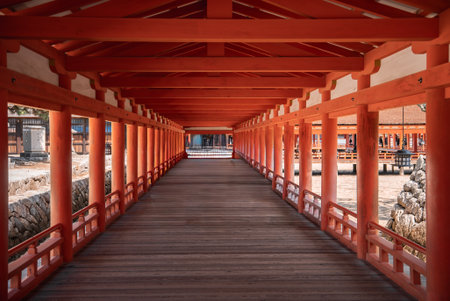Vermilion corridor at Itsukushima Shrine on Miyajima Island, Japanの写真素材