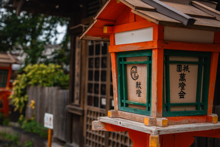 Kyoto Shinto shrine lantern close up with kanji and crest emblemの写真素材