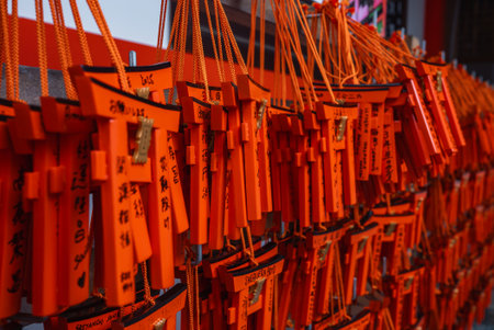 Vermilion torii ema plaques with prayers at Fushimi Inari Taishaの写真素材