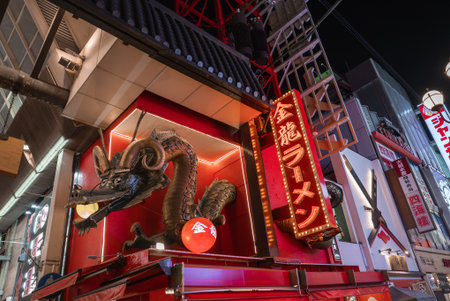 Night view of Kinryu Ramen dragon facade in Dotonbori, Osaka