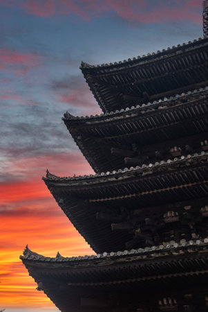 Close up of Yasaka Pagoda at dusk in Kyoto with silhouetted eavesの写真素材