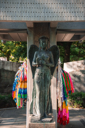 Bronze angel statue and senbazuru at Hiroshima Peace Memorial Parkの写真素材