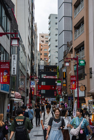Tokyo Asakusa pedestrian lane with lantern lights and shop signsの写真素材