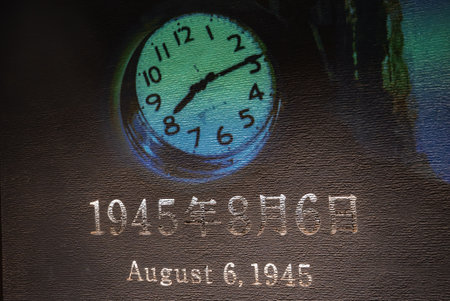Stopped analog clock with August 6, 1945 inscription in Hiroshimaの写真素材