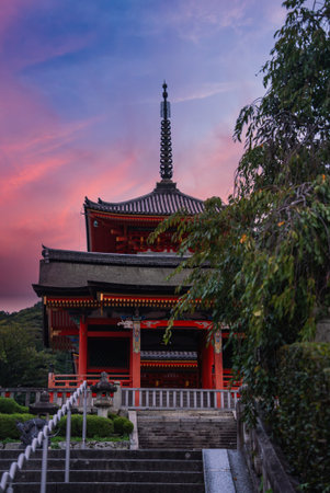Vermilion temple gate at stone steps in Kyoto, Japan at twilightの写真素材