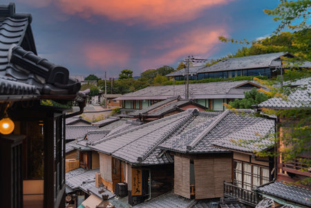 Kyoto Higashiyama machiya rooftops at dusk near Sannenzaka lanesの写真素材