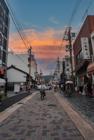 Pedestrian lane with shops and signs in Nara at late afternoonの写真素材