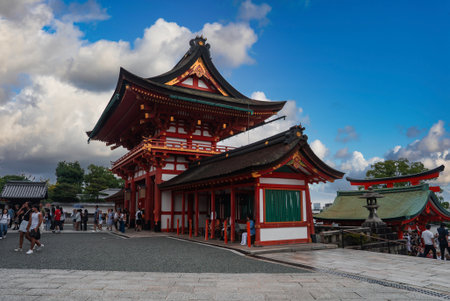 Fushimi Inari Taisha entrance with tourists in Kyoto, Japanの写真素材