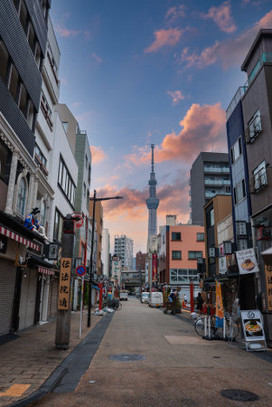 Tokyo street view with Tokyo Skytree beyond local shops and lanternsの写真素材