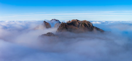 Rugged summit above cloud sea at Pico do Arieiro, Madeira