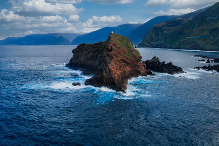 Aerial sea stack and terraced cliffs on Madeira north coast daylightの写真素材