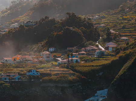 Hillside village on terraced slopes in rural Madeira, Portugalの写真素材