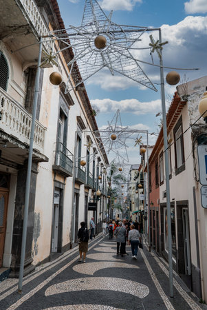 Funchal Madeira street with star lights and calcada Portuguesa wavesの写真素材
