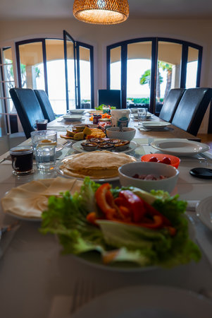 Breakfast table set indoors with terrace view in Funchal, Madeiraの写真素材