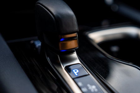 Lexus RX 450h plus gear selector with blue P indicator indoors