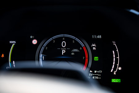 Lexus RX 450h plus digital cluster with speedometer at 0 and EV mode
