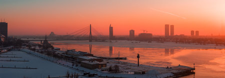 Winter sunset over Riga, Latvia with Vansu Bridge and Z Towers