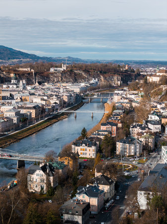 Aerial Salzburg view with Salzach River and Hohensalzburg Fortress in winterの写真素材
