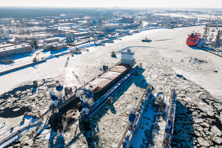 Aerial winter view of Riga Shipyard, Daugava River, Riga, Latviaの写真素材