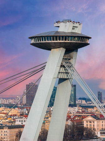 SNP Bridge UFO observation deck and pylon in Bratislava at sunsetの写真素材