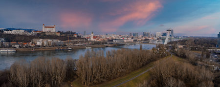 Aerial dusk panorama of Bratislava with castle and UFO Towerの写真素材