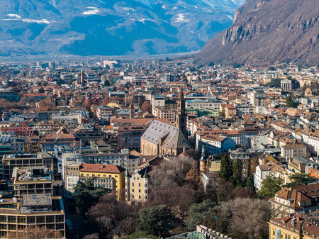 Aerial Bolzano, Italy with Bolzano Cathedral and Dolomite foothillsの写真素材