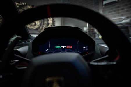 Drivers seat view of Lamborghini Huracan STO digital cluster