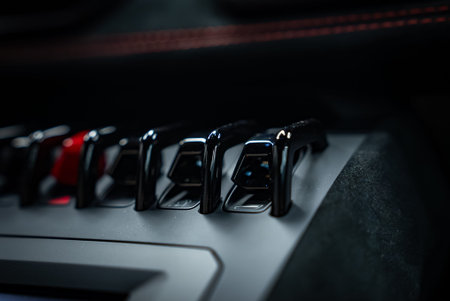 Lamborghini Huracan toggle switches on center console, studio shot