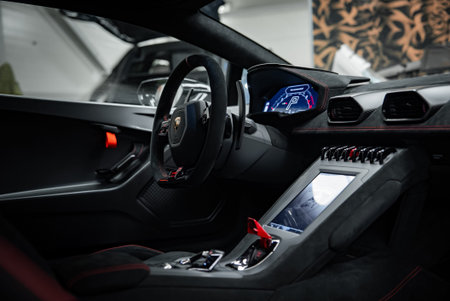 Lamborghini Huracan cockpit with hex vents and red start cover