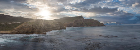Cape Point and Cape of Good Hope cliffs under stormy sunset light