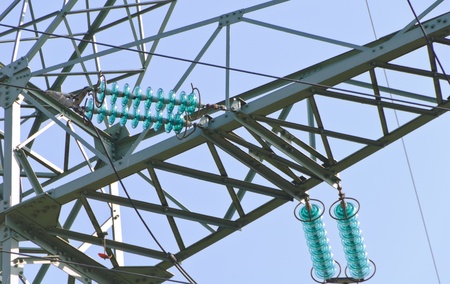 Traverse and insulators at a tension tower of a high-voltage lineの写真素材
