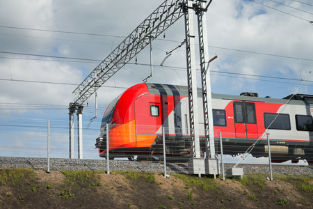 Modern suburban electric train in motion