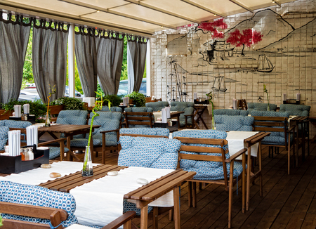 MOSCOW, RUSSIA - AUGUST 13, 2018: The interior of the summer terrace of a popular restaurant with Japanese cuisine.のeditorial素材