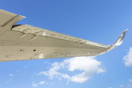 ZHUKOVSKY, MOSCOW REGION, RUSSIA - AUGUST 28, 2019: A close-up of a fragment of a wing of an Airbus A350 XWB passenger jet at a demonstration in Zhukovsky during the MAKS-2019 air show.のeditorial素材