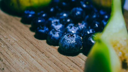Blueberry on wooden board.