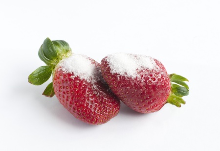 sugary strawberries on white backgroundの写真素材