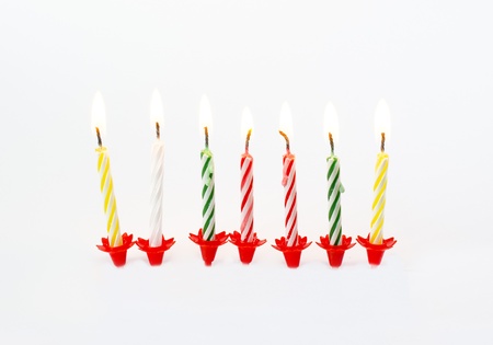 Illustrated Burning Birthday Candles in white backgroundの写真素材