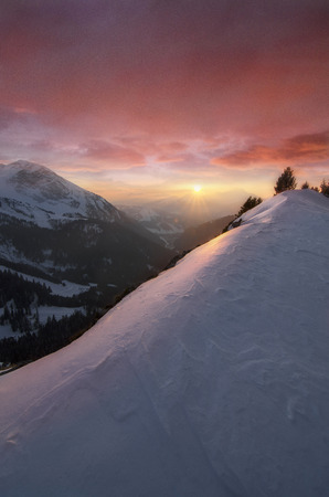 Colorful sunset over the French Alps in winterの写真素材