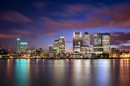 Colorful sunset over Canary Wharf, London skylineの写真素材
