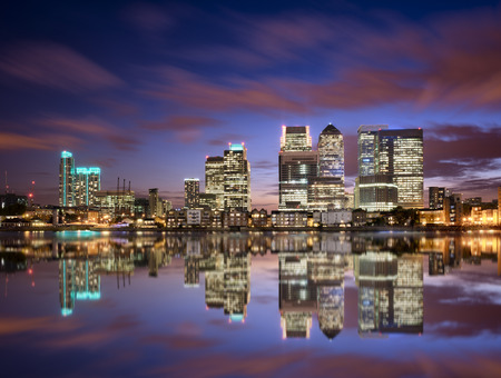 Colorful sunset over Canary Wharf, London skylineの写真素材