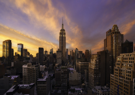 Colorful sunset over manhattan skyline, New yorkの写真素材