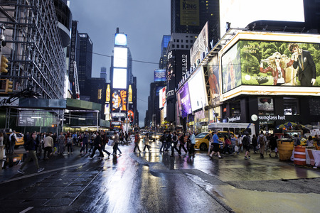 NEW YORK CITY - september 13, 2014: Times Square, featured with Broadway Theaters and animated LED signs, is a symbol of New York City and the United States, September 13, 2014 in Manhattan, New York City.のeditorial素材
