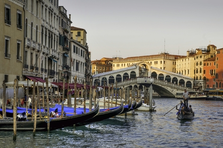 VENICE, ITALY - September 2011: Typical canal scene of gondolas and gondoliers, in Venice, Veneto, Italyのeditorial素材
