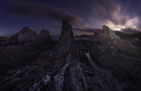 Gueirua coast at night, Asturias, Spain, in a starry nightの写真素材
